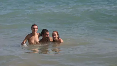 Pornstar little redhead Lola Bella removing clothes by the sea  photo 2