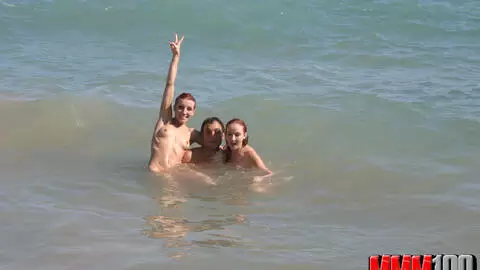 Pornstar little redhead Lola Bella removing clothes by the sea  photo 5