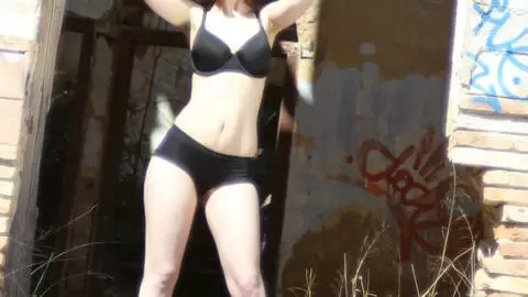 Nice with big tits Lola Vinci doing a strip in an abandoned house  photo 7