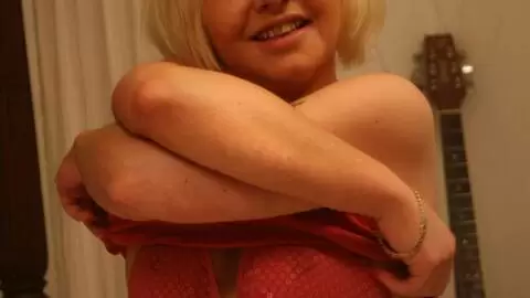 Maeva Blue beautiful Blondinette stripping on the bed photo 4