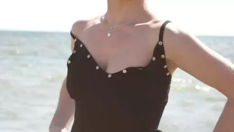 Small tits babe making hot strip on the rocks photo 12