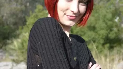 Hot petite redhead Mahylis removing clothes in the woods  photo 2