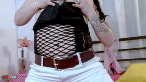 Mature brunette with big tits Margaux Lenoir doing a strip on the bed  photo 02