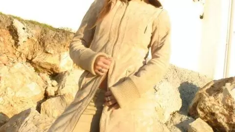 Pretty petite blonde Marta doing a hot striptease by the sea  photo 3