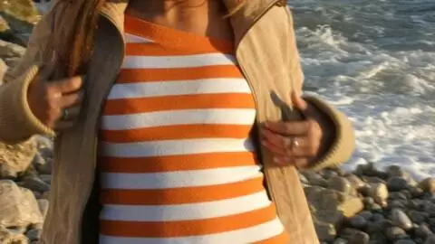 Pretty petite blonde Marta doing a hot striptease by the sea  photo 7