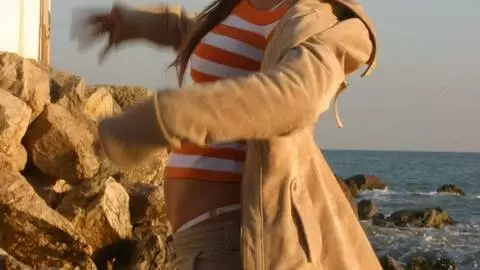 Pretty petite blonde Marta doing a hot striptease by the sea  photo 8