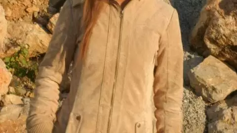 Pretty petite blonde Marta doing a hot striptease by the sea 