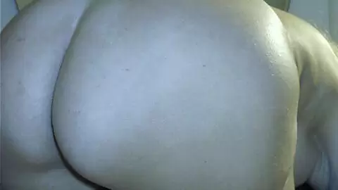 Mature blonde with big boobs Martha stripping on the bed  photo 11