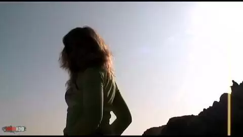 Mature slut giving a blowJob on the beach photo 01