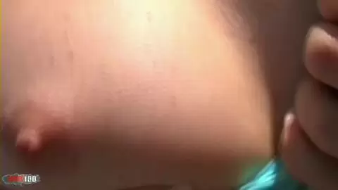 Young French blonde Melissa naked on the beach