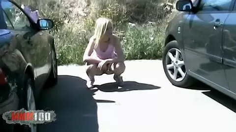 Young French blonde Melissa pees in a parking lot photo 05