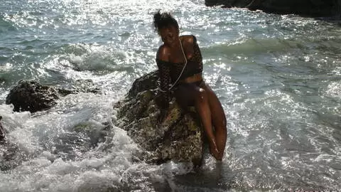 Pretty ebony Naomi Lionness removing clothes  photo 14