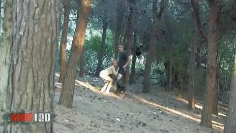 girl sucking her BF in the wood, shoot by a voyeur photo 15