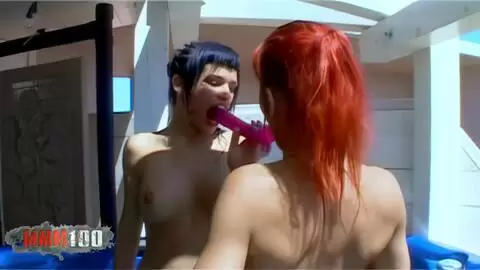 2 beautiful porn stars play with a pink dildo in a hot tub photo 13