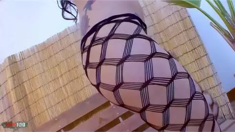 Photo session with French porn star Nina Roberts in fishnet and red boots photo 07