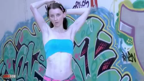 The young French Pauline Cooper does a striptease in front of a Tag wall photo 01