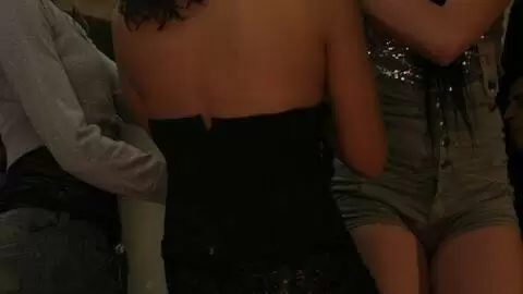 Three horny bitches flashing in a nightclub photo 1