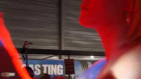 2 stripers having sex with a strapon in public photo 04