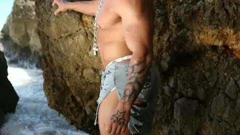 Horny Rob Diesel removing clothes on the beach  photo 1