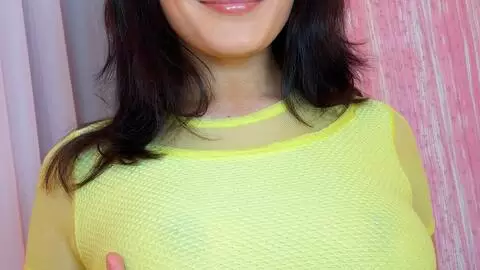 Photos of a young brunette in black jeans, white panties and a yellow top photo 4