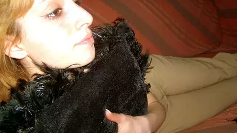 Little teen blonde posing and stripping on the sofa photo 8