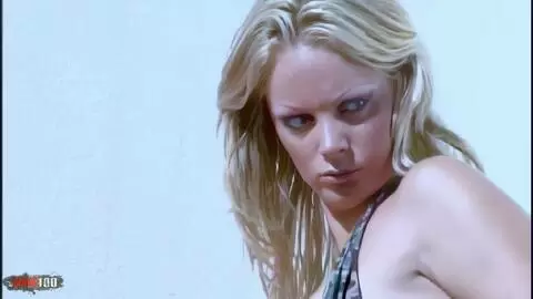 The pretty blonde with big tits Sheila does a strip on the terrace photo 02