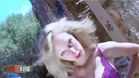 Beautiful French blonde Starla Candy does a strip tease in old ruins