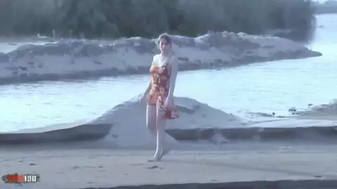 Sensational striptease of pretty blonde Tigra undressing by the sea and ends totally naked  photo 02