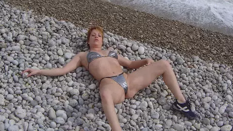 Nice blonde Tigra getting naked on the beach  photo 14