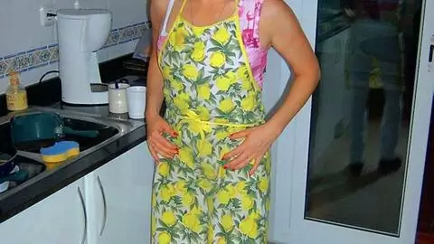 Pretty blonde Tigra getting naked in the kitchen  photo 1