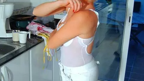 Pretty blonde Tigra getting naked in the kitchen  photo 7