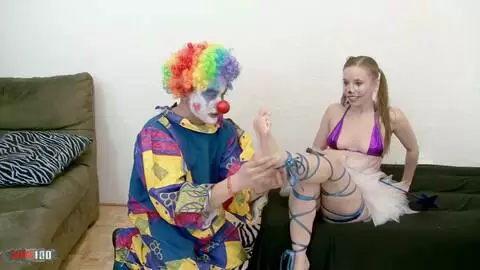 Skinny young blonde babe Norah Nova fucked by a clown photo 04