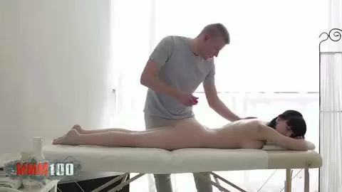 Gorgeous young Russian brunette with a perfect body gets fucked by a big cock on the massage table photo 01