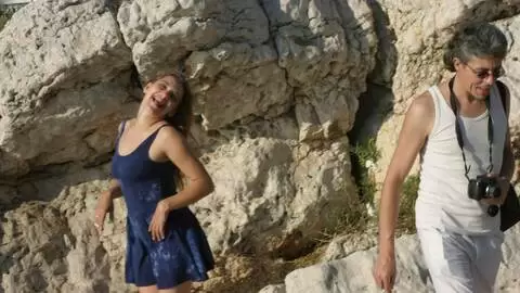 Horny blonde Val removing clothes in the rocks 