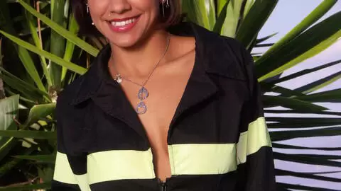 whore doing a strip by the pool