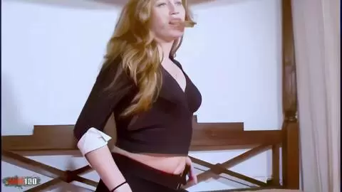 Nice redhead Yvonne stripping on the bed 